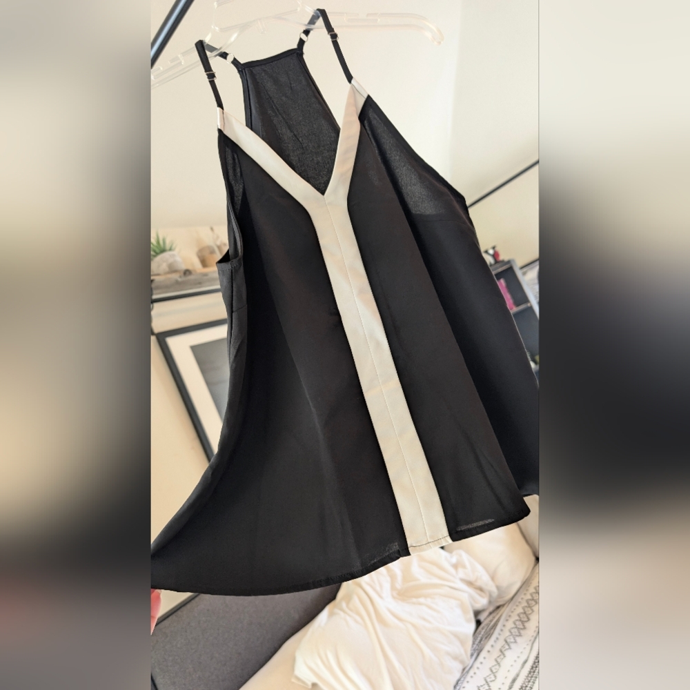Black Sleeveless Top with White Trim